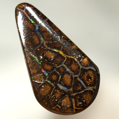 SOLID BOULDER OPAL Perfect flagstones surrounded by gem opal rivers, bright sparkles. Red, orange, green, blue.